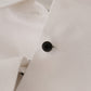 Dolce & Gabbana Elegant Sleeveless Tuxedo Blouse with Crystal Buttons